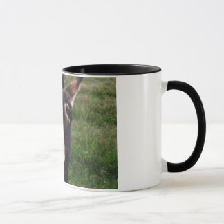 Caneca de sorriso do asno