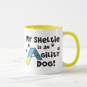Caneca do cão da agilidade de Sheltie