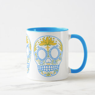 Caneca do crânio do açúcar (azul/amarelo)