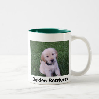 Caneca do filhote de cachorro do golden retriever