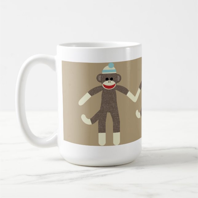 Caneca dos amigos do macaco da peúga do menino (Esquerda)