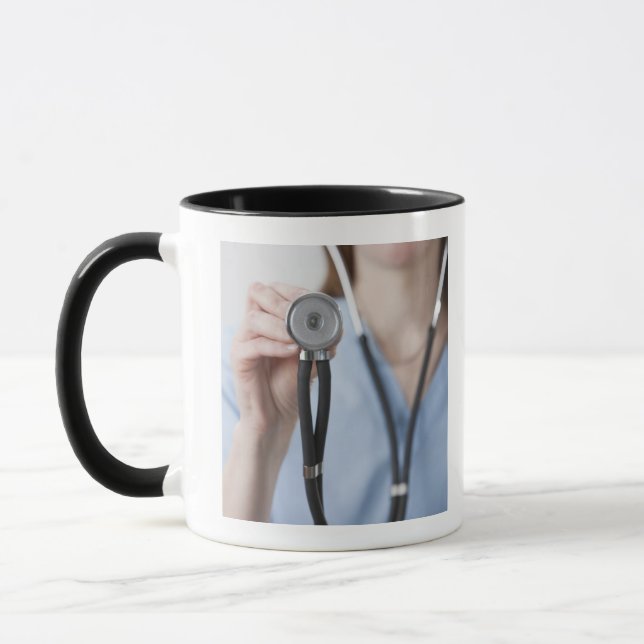 Caneca Doutor fêmea de sorriso com estetoscópio (Esquerda)
