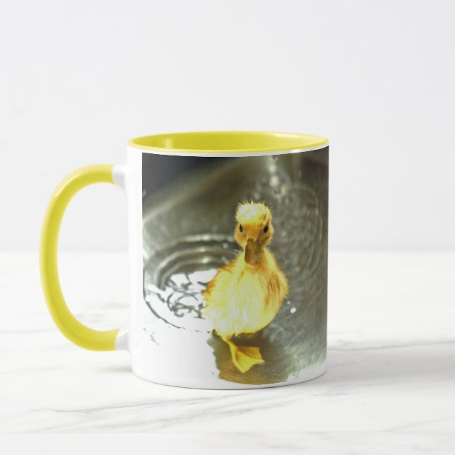 Caneca Duckling tem um banho. (Esquerda)