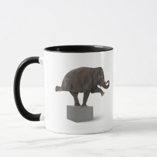 Caneca Elefante que executa o truque na caixa