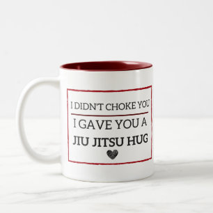 Caneca engraçada do abraço de Jiu Jitsu
