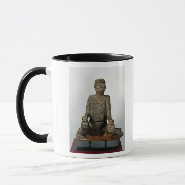 Caneca Estátua de um homem assentado, Mbembe, Nigéria (Esquerda)