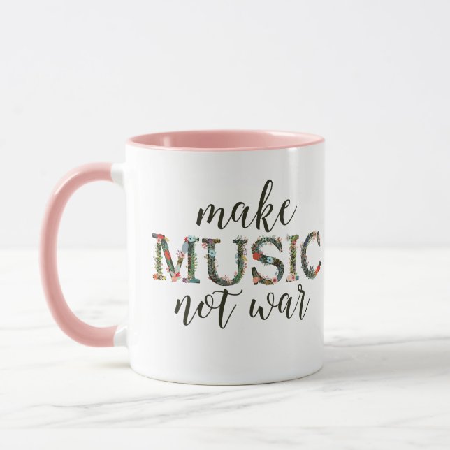 Caneca Fazer música não entrar em guerra com texto floral (Esquerda)