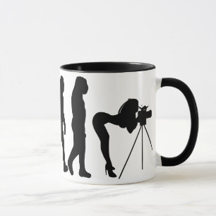 Caneca fêmea da evolução do fotógrafo