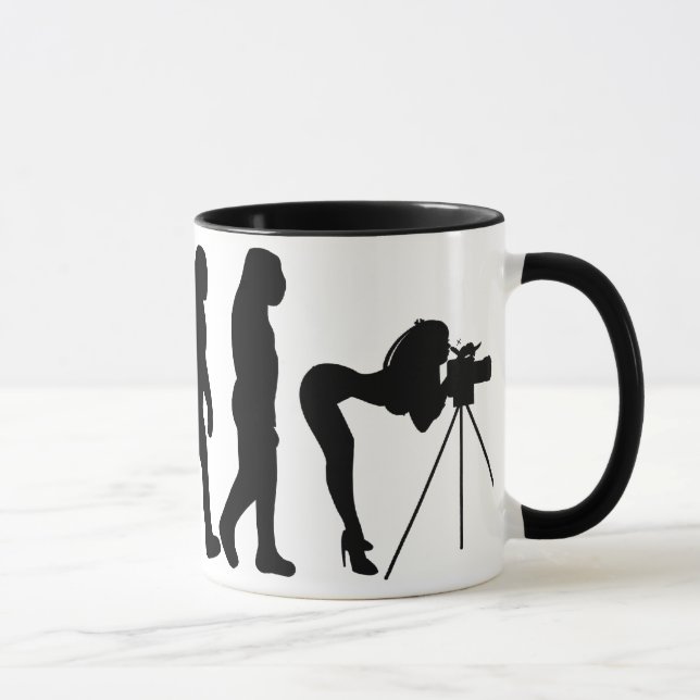 Caneca fêmea da evolução do fotógrafo (Direita)