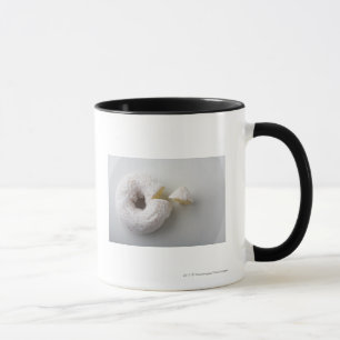 Caneca Fim-acima de um bolo