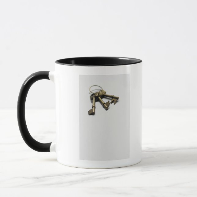 Caneca Fim-acima de um grupo de chaves (Esquerda)