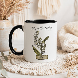 Caneca Flor de Nascimento Flor de Maio Vale dos Lírios