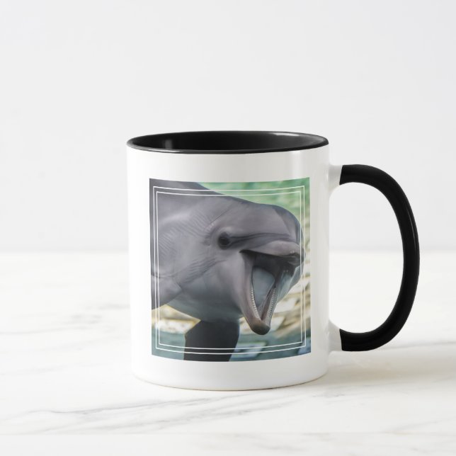 Caneca Golfinho das imagens | de Getty (Direita)