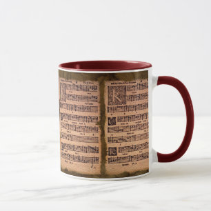 Caneca gregoriana do bebendo da folha de música d