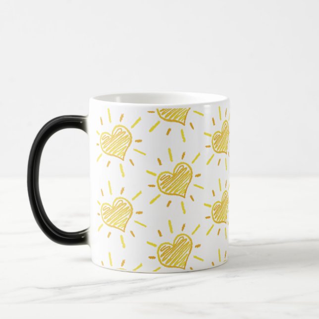 Caneca Mágica Two-colour coffee mug with hearts design. (Esquerda)