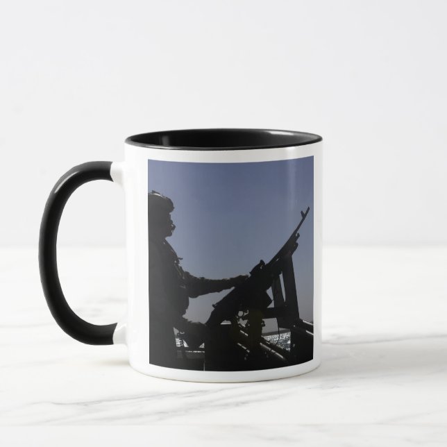 Caneca Manning de um metralhador M240 no Iraque (Esquerda)