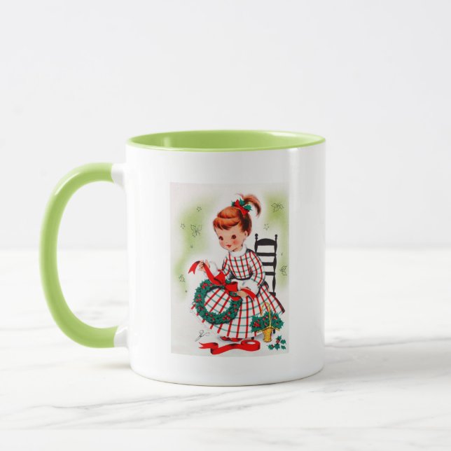 Caneca Menina clássica do Natal com fitas da grinalda (Esquerda)