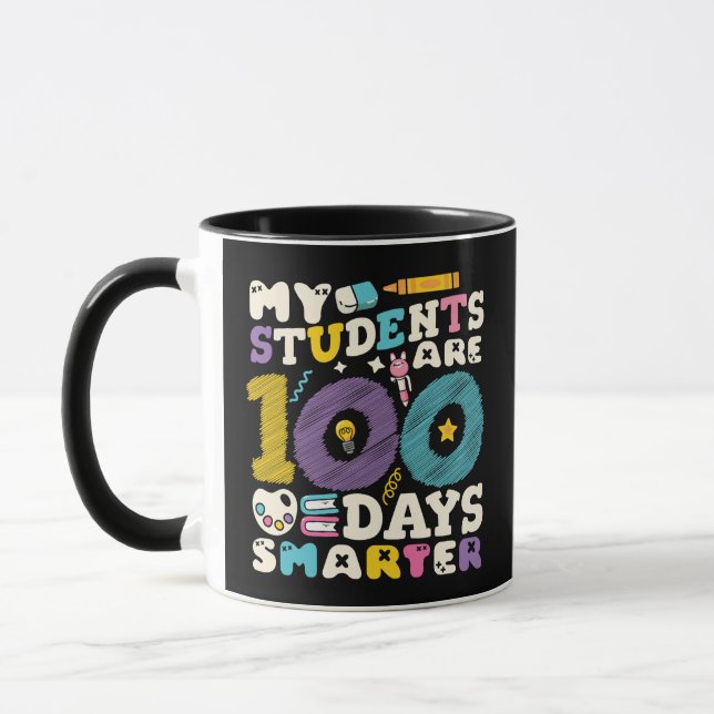 Caneca Meus alunos são 100 dias mais inteligentes e bonit (Esquerda)
