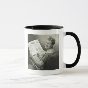Caneca Mulher que senta-se na cadeira