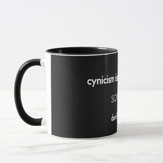 Caneca o cinismo é veneno lento...em branco no preto (Esquerda)