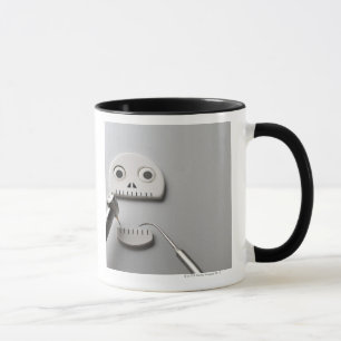 Caneca O esqueleto que o tratamento dental é tomado
