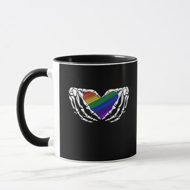 Caneca Orgulho - Mãos de Esqueleto Segurando Cardíaco Clá (Esquerda)