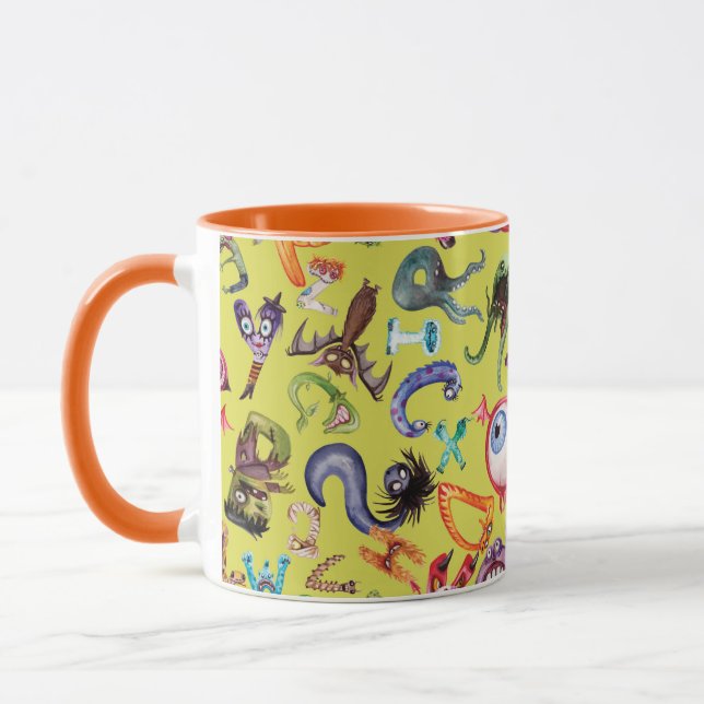 Caneca Padrão de criança do alfabeto monstro (Esquerda)