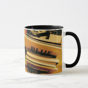 Caneca Pilha de livros e de compartimentos