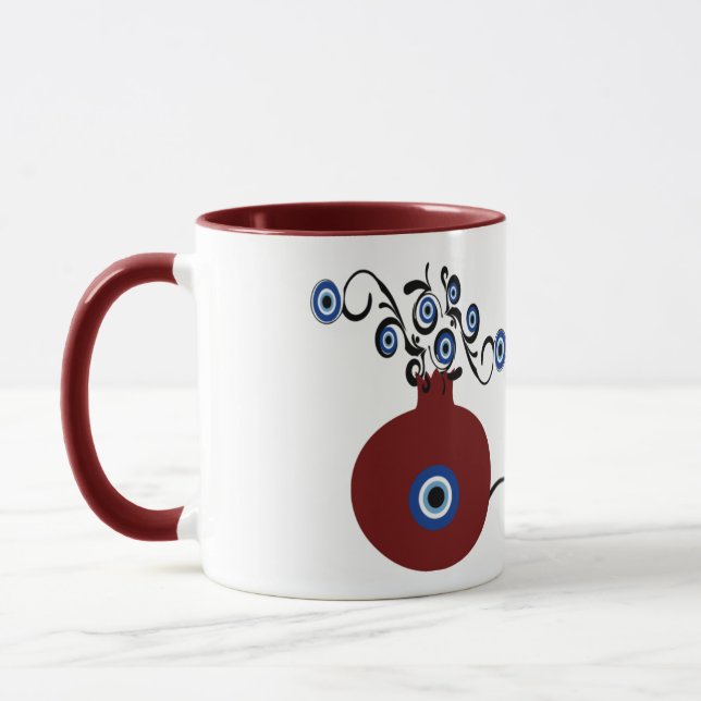 Caneca pomegranate with evil eye mug (Esquerda)