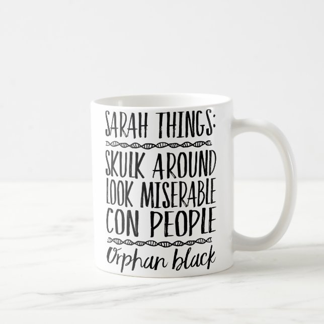 Caneca preta órfão das coisas de Sarah (Direita)