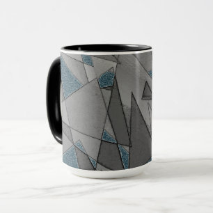 Caneca recortes triangulares de cinza com peças azuis es