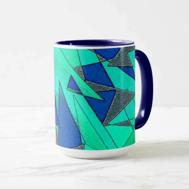 Caneca recortes triangulares verdes sobre fundo azul, ásp (Frente Esquerda)