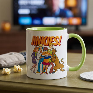 Caneca Scooby-Doo e o grupo investigam o livro