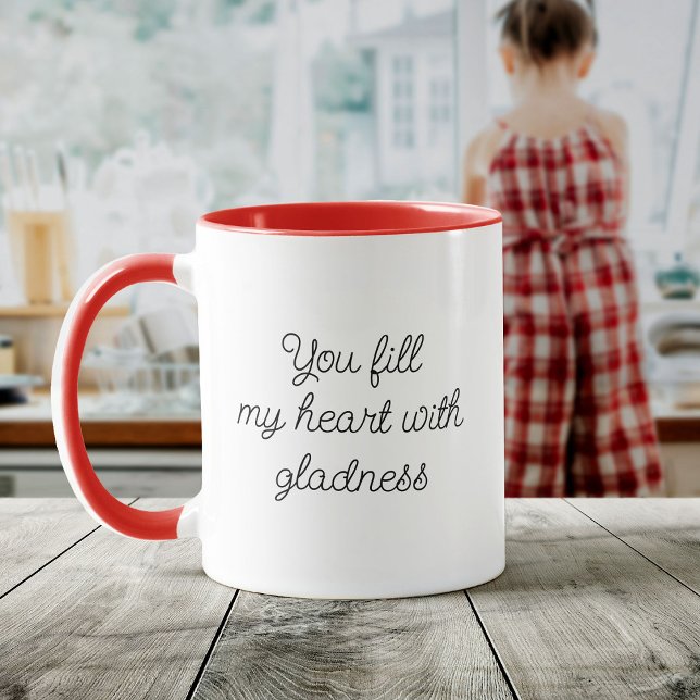 Caneca Script Moderno Você Enche Meu Coração Com Gladura (A white mug with a red handle and interior reads, "You fill my heart with gladness")