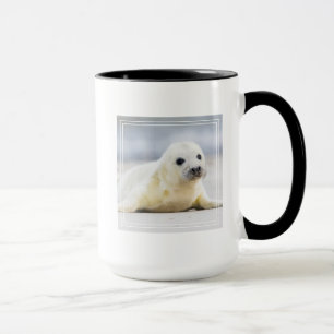 Caneca Selo de bebê das imagens   de Getty