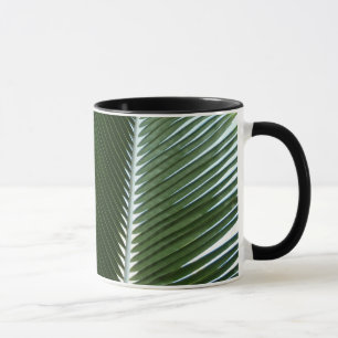 Caneca Sobreposição das bordas das palmas Abstrato Verde
