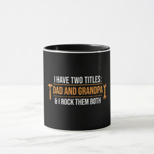 Caneca Tenho Dois Títulos Papai e Vovô Faz-tudo Pai