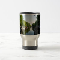 Canal de Amsterdã com Barcos e Ponte Foto de Viage