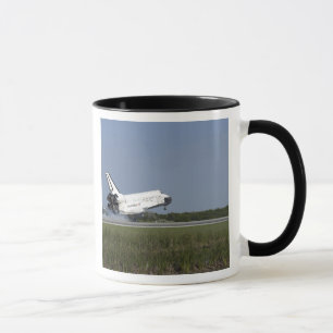 Caneca Terras da descoberta do vaivém espacial na pista