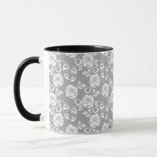 Caneca Teste padrão branco do laço no fundo cinzento