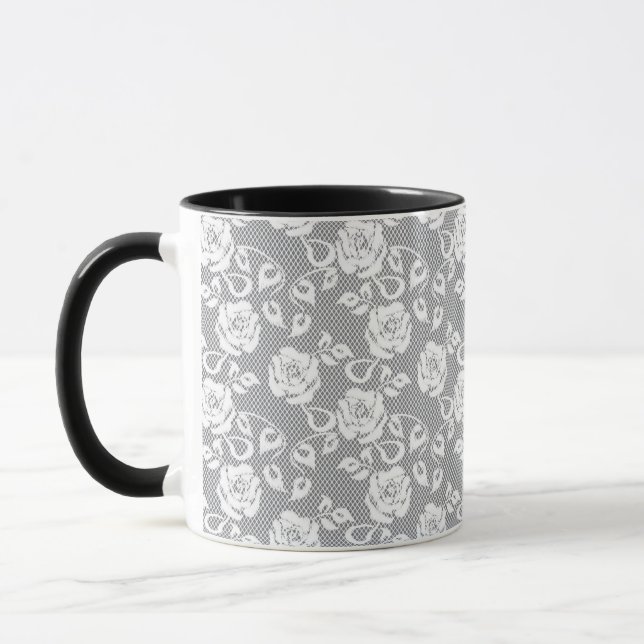 Caneca Teste padrão branco do laço no fundo cinzento (Esquerda)