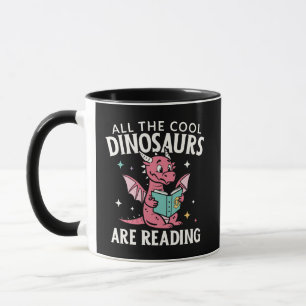 Caneca Todos os Dinossauros Legais Estão Lendo