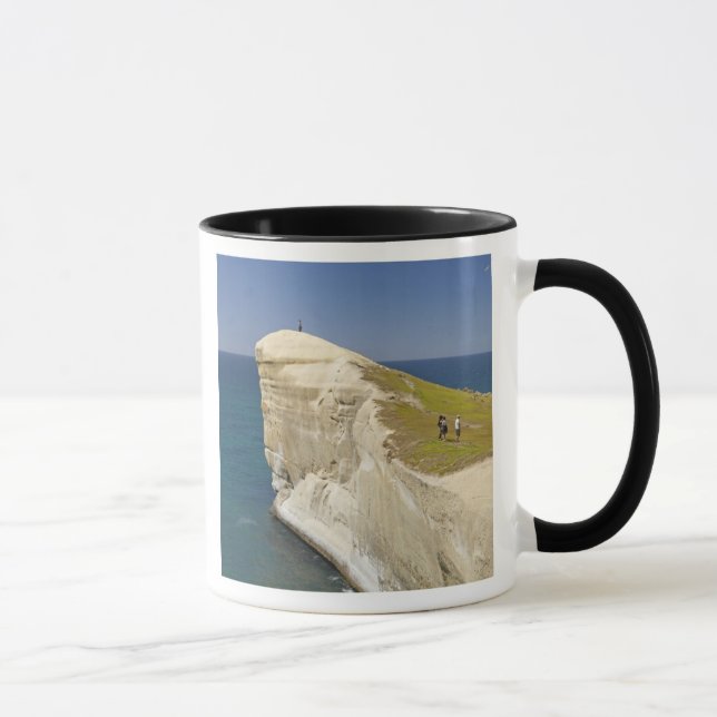 Caneca Turistas no topo do túnel na praia (Direita)
