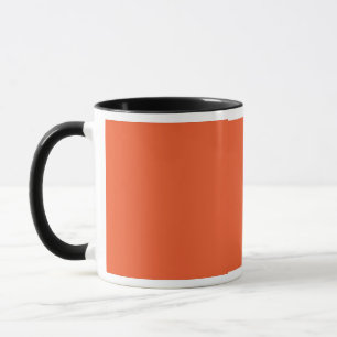 Caneca um fundo laranja com uma borda negra