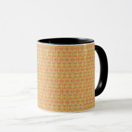 Caneca um fundo laranja e amarelo com um padrão
