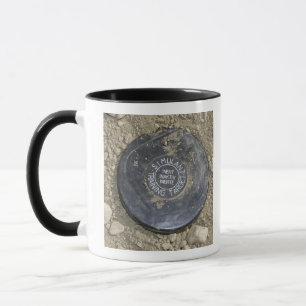 Caneca Uma mina terrestre simulada