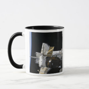 Caneca Uma nave espacial Soyuz atracada