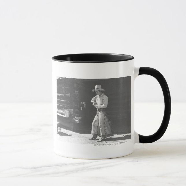 Caneca Vaqueiro que come de uma manteiga de amendoim Can. (Direita)