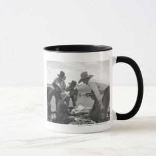 Caneca Vaqueiros que olham um compartimento