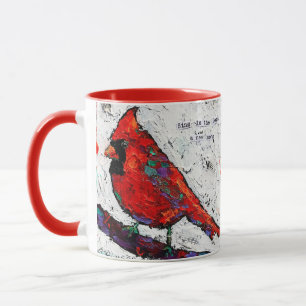 Caneca vermelha da escritura do pássaro